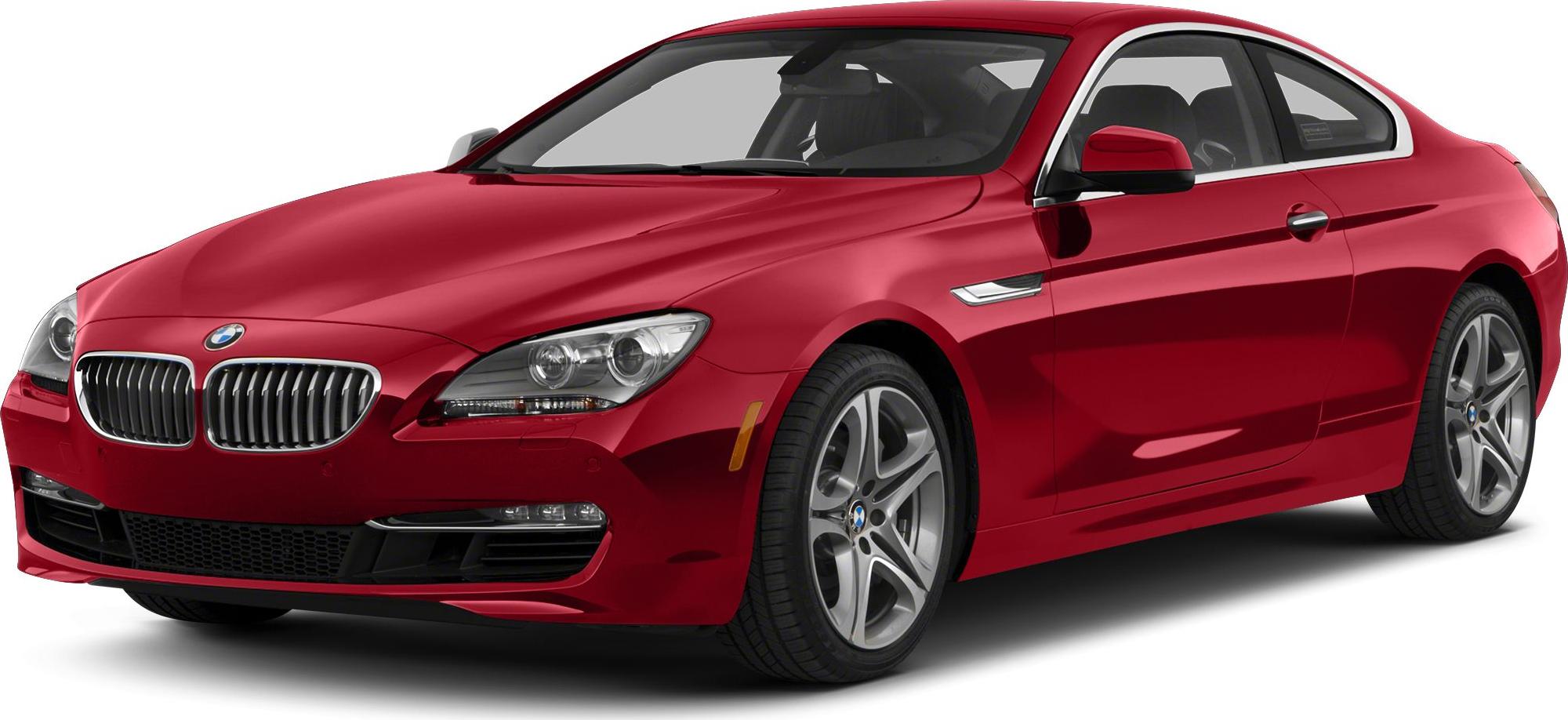 Front view of red luxury coupe with kidney grille and alloy wheels