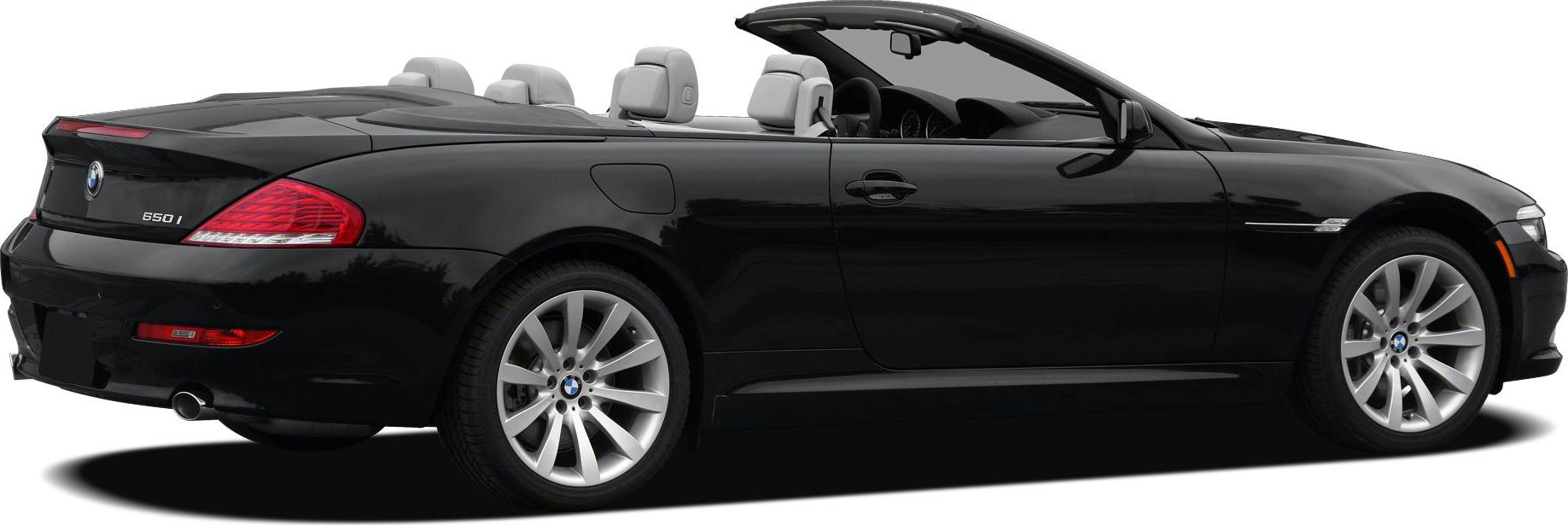 Black BMW convertible with open roof and luxury design