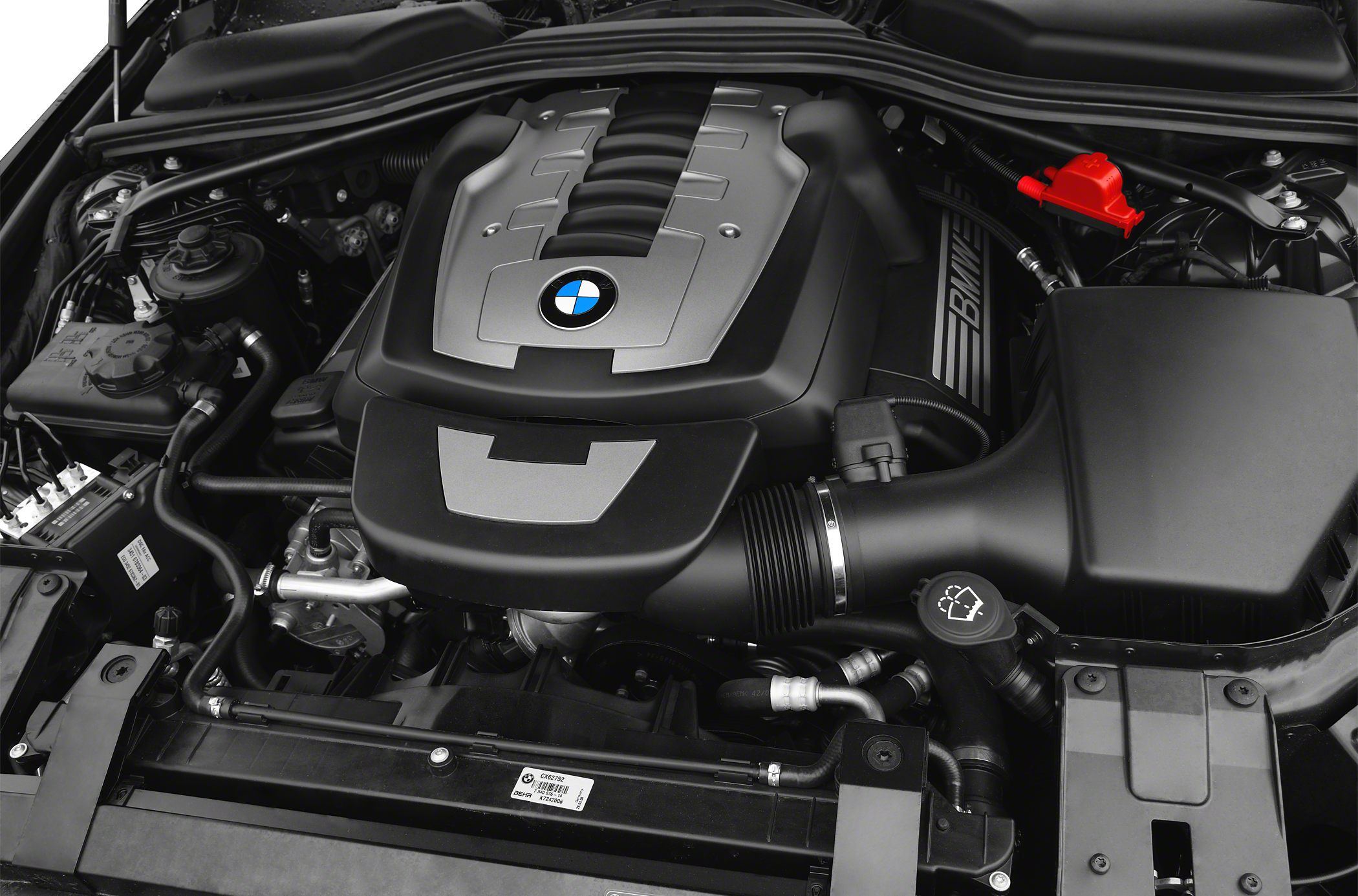 Engine bay with BMW branded engine cover and components