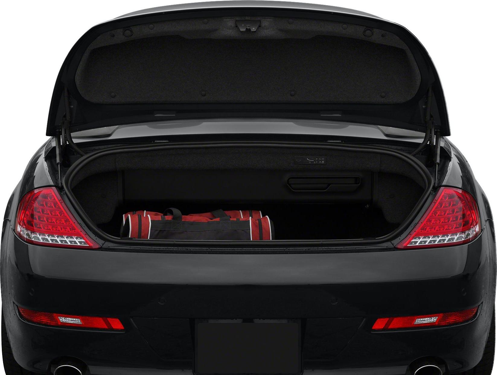 Open rear trunk with spacious storage and sports bag inside