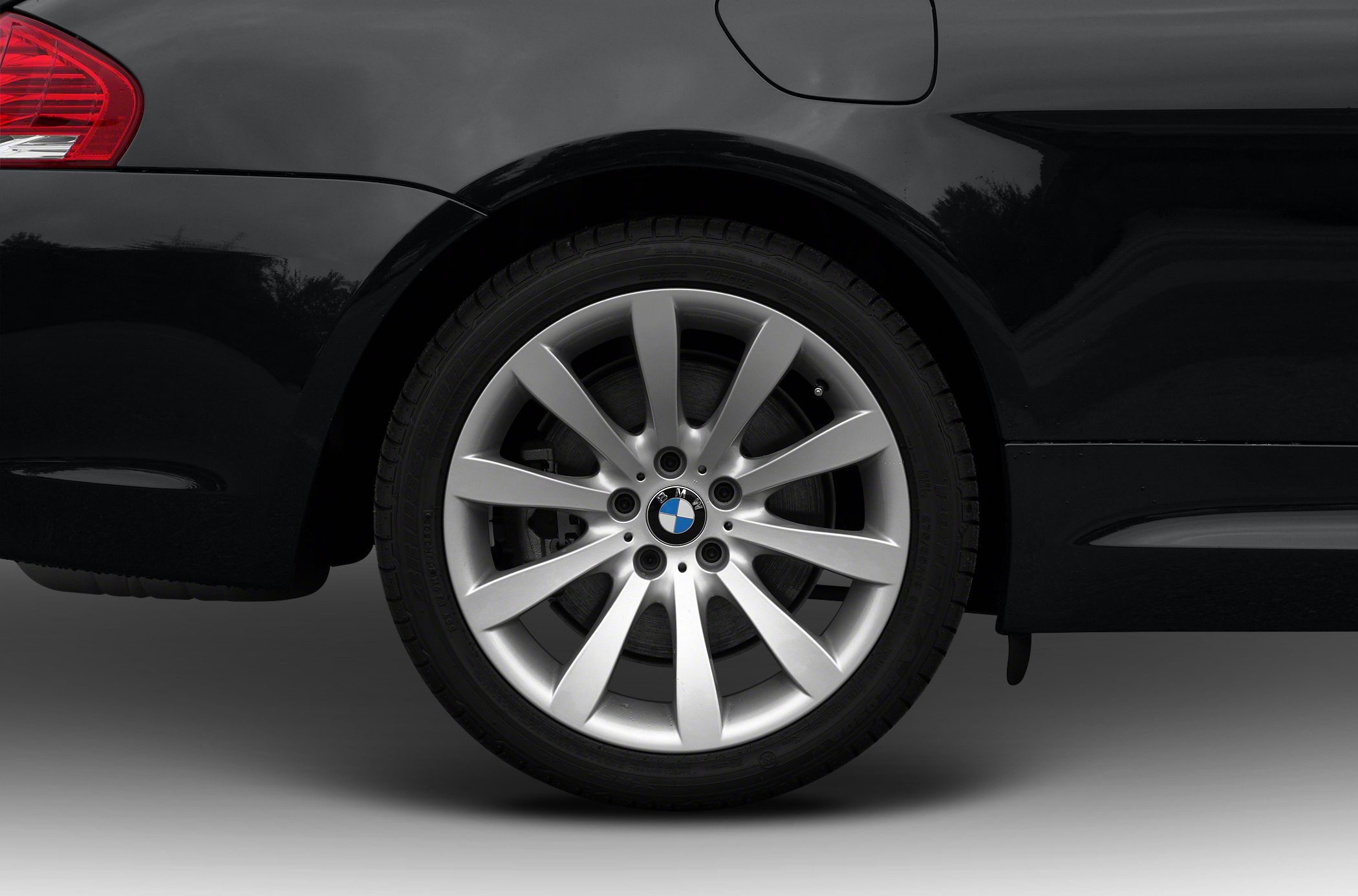 Silver alloy wheel with rear fender and fuel cap