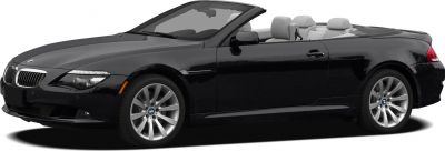 Convertible luxury coupe with open top and silver alloy wheels