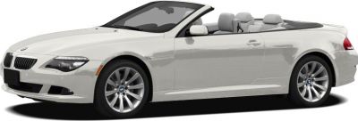 White luxury convertible with soft top down and sporty alloy wheels