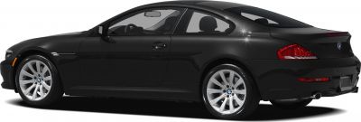 Rear-side profile of sleek coupe with alloy wheels