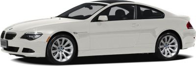 White coupe with sleek side profile and alloy wheels