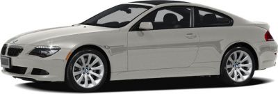 Side profile of a sleek 2007 coupe with aerodynamic design and alloy wheels