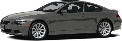 Sleek coupe side profile with alloy wheels and tinted windows.