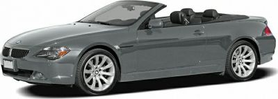 Side view of BMW 6 Series Convertible with open roof.