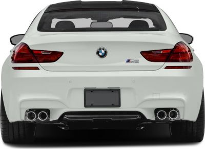 Rear view with quad exhaust and sleek taillights