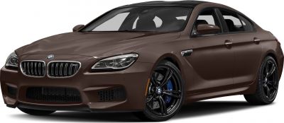 Front-side view of sporty luxury sedan with kidney grille and alloy wheels.