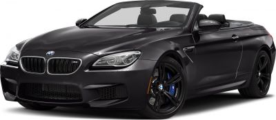 Black BMW convertible with sporty front end and open roof