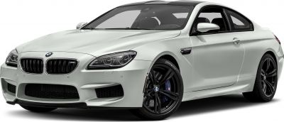 White coupe with sporty black wheels and aggressive front air intakes