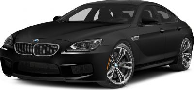 Front grille, headlights, and alloy wheels of a luxury sport sedan