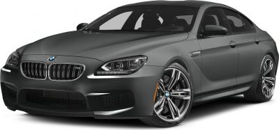 Front angled view of sleek luxury coupe with detailed wheels