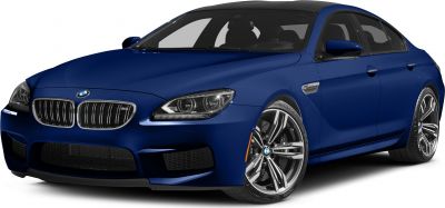 Front angled view showing headlights, grille, and wheels of a luxury four-door coupe