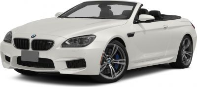 White BMW sports convertible with alloy wheels and open roof
