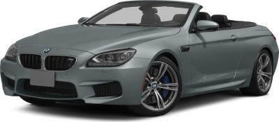 Convertible vehicle front side view with alloy wheels and prominent headlights