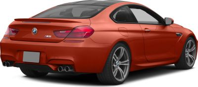 Rear view of sports coupe with quad exhausts and taillights