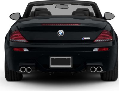 Rear view with quad exhaust, LED taillights, open convertible roof