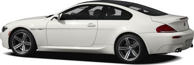 White coupe side profile with alloy wheels and sleek lines