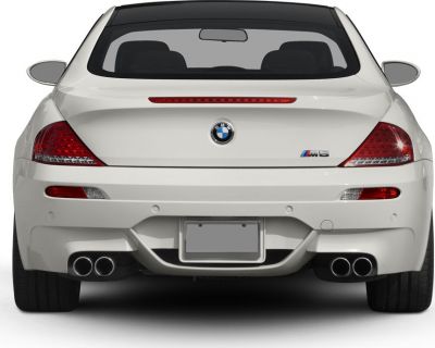 Rear view with quad exhaust and facelift tail lights