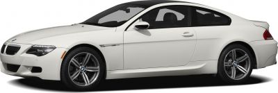 Side view of coupe with alloy wheels and sleek design