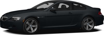 Side profile of a sleek two-door coupe with alloy wheels