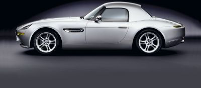 Silver coupe side profile with iconic side vents and alloy wheels