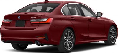 Red sedan rear view with dual exhausts and modern tail lights