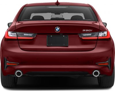 Car rear design with dual exhaust and distinctive taillights