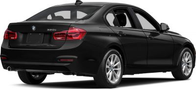 Rear side view of black sedan with LED taillights and single exhaust pipe