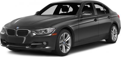 Sleek black luxury sedan with modern headlights and alloy wheels.