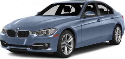 Front view of sedan with kidney grille, headlights, and alloy wheels