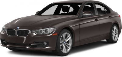 Front three-quarter view showing headlights and alloy wheels of a sedan.