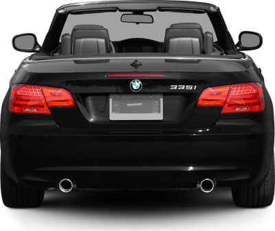 Rear view of convertible with dual exhausts and distinct taillights