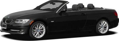 Black convertible with open roof, sporty alloy wheels, sleek body design