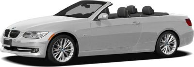 Silver convertible with open roof and alloy wheels, side profile.