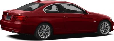 Rear side profile with alloy wheels of a red coupe.