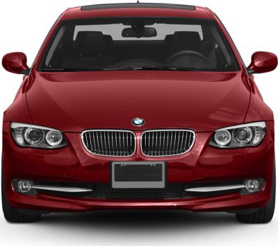 Front view with kidney grille and headlights of a red coupe