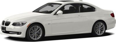 White coupe with sleek two-door design and alloy wheels