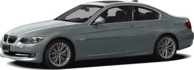 Side profile of a coupe with alloy wheels and sleek design