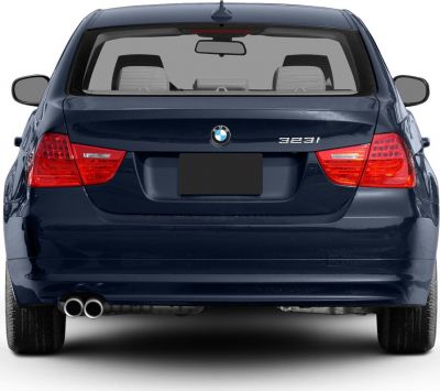 Rear view with taillights and dual exhaust of a sport sedan