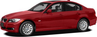Red four-door sedan, front left angle, kidney grille, alloy wheels