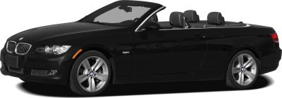 Black convertible coupe with soft-top and sporty alloy wheels