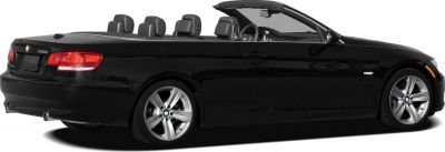 Side profile of convertible with roof down and visible interior seats