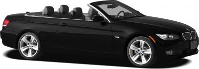Black convertible with open roof and visible interior seating