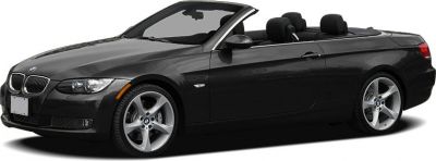 Black convertible with open roof and sporty alloy wheels