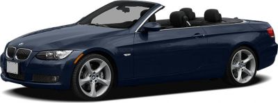 Blue convertible with open roof and sporty alloy wheels