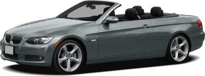 Sleek gray convertible with open roof and sporty alloy wheels