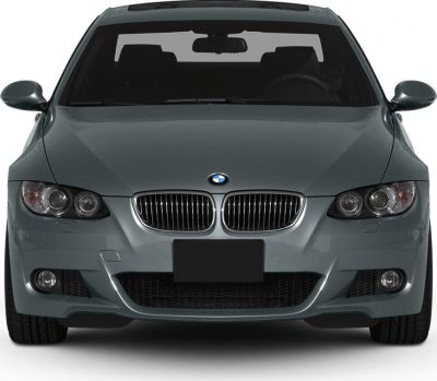 Front view with kidney grille and dual round headlights.